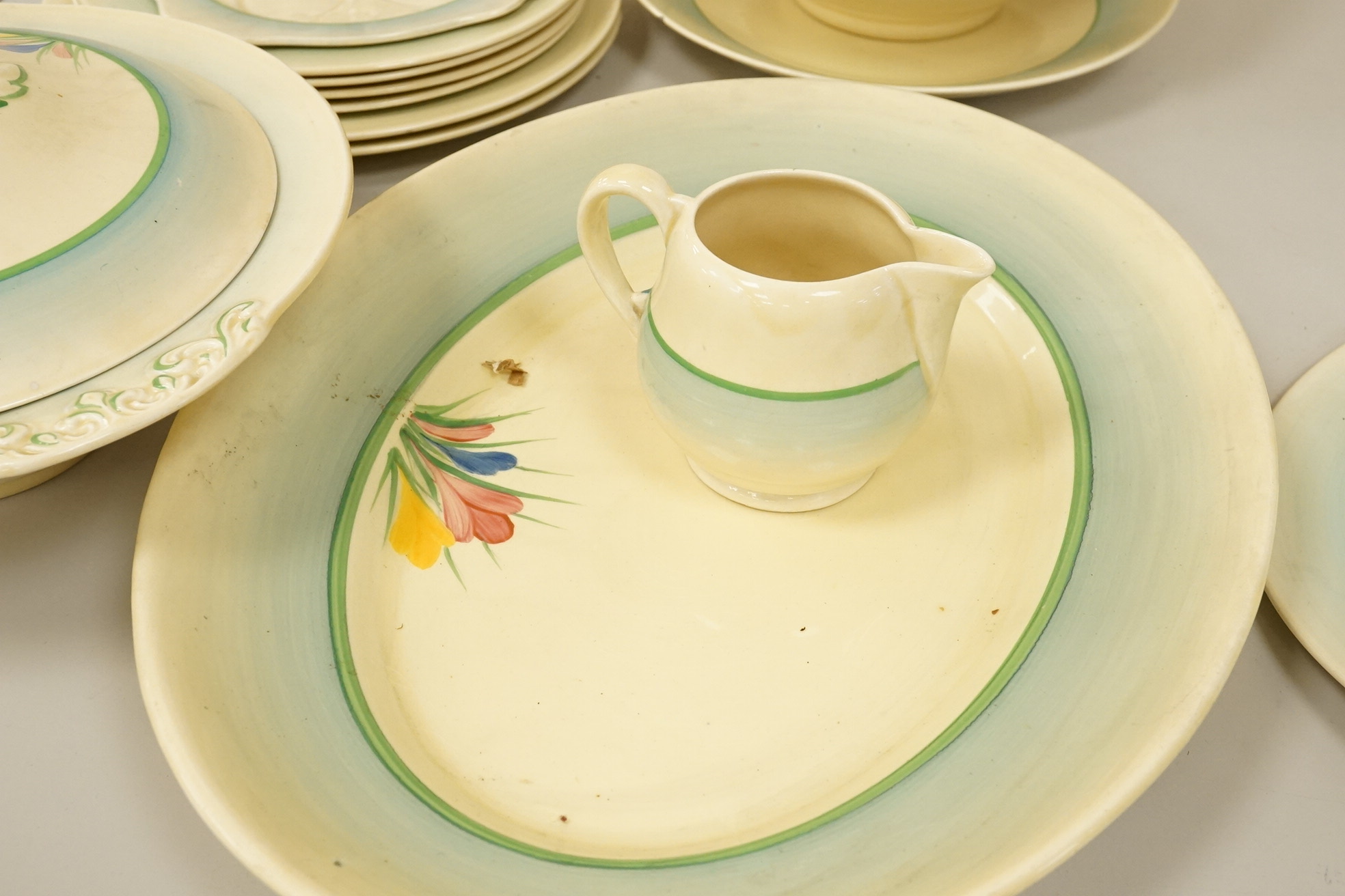 A collection of Clarice Cliff, Newport Pottery and Spring Crocus pattern tableware